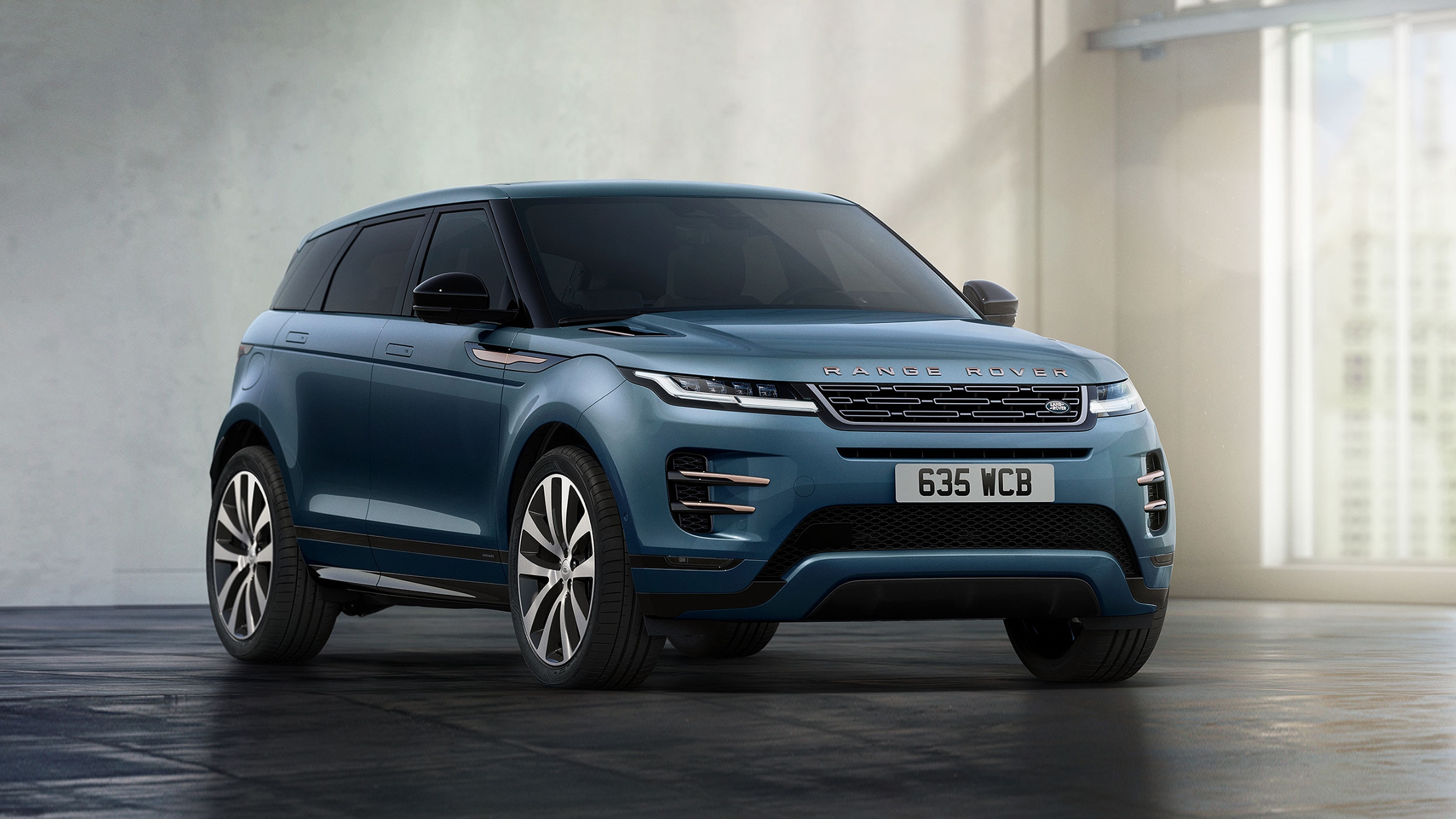 Blue RR Evoque stopped